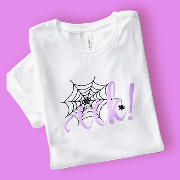 white t-shirt with spider design on purple background